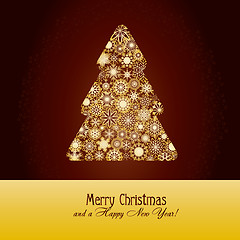 Image showing Christmas greetings card with fir tree made from gold snowflakes on brown background