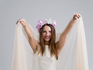 Image showing young bride in a wedding dress with a veil