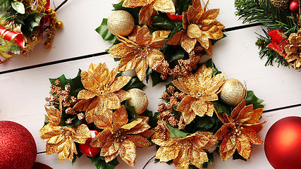 Image showing Christmas Wreath on White Wooden Background