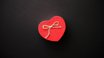 Image showing Heart shaped Valentines Day gift box on black bacground.