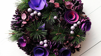 Image showing Christmas Wreath on White Wooden Background