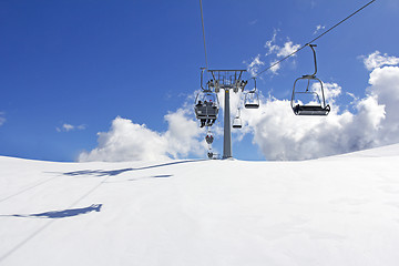 Image showing Mountain slopes with Ski lift on a winter sunny day