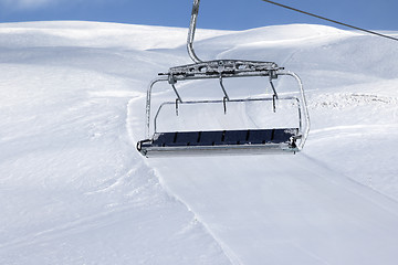 Image showing Ski slope, chair-lift on ski resort 