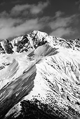 Image showing Black and white snow mountain peak at sunny day