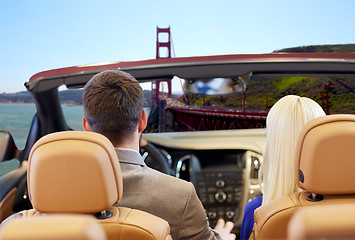 Image showing couple driving in car over golden gate bridge