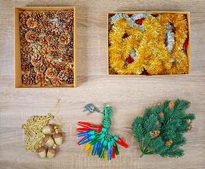 Image showing Traditional christmas tree decorations including baubles, fir cones.