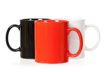 Image showing Three cups on white