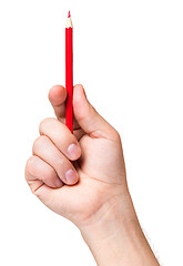 Image showing Hand with red pencil