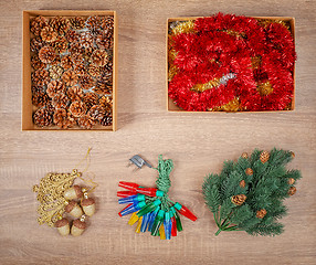 Image showing Traditional christmas tree decorations including baubles, fir cones.