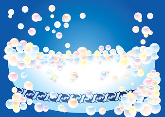 Image showing A bathtub on blue background with bubbles