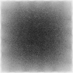 Image showing Black and white textured background with light leaks and grain.