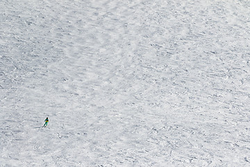 Image showing Skier downhill on snow slope