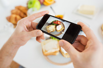 Image showing hands with smartphones photographing food