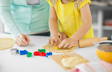 Image showing mother and daughter making cookies at home