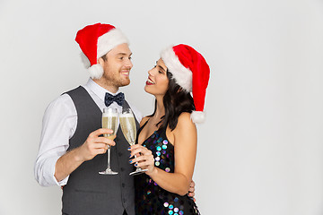 Image showing couple with champagne glasses at christmas party