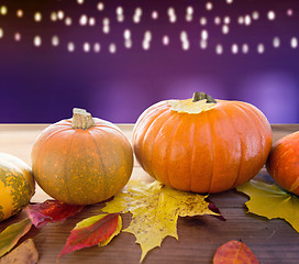 Image showing close up of pumpkins on wooden table