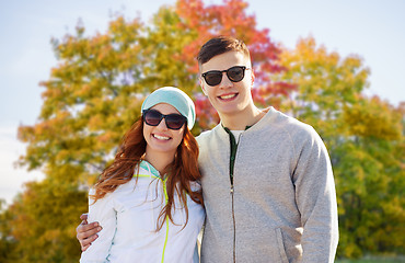 Image showing happy teenage couple in autumn park