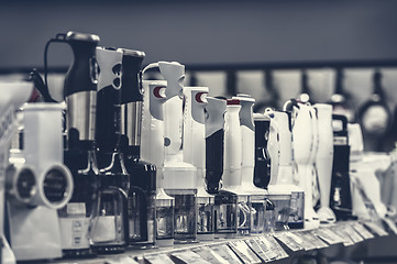 Image showing row of variety blenders in retail store