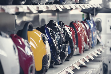 Image showing Row of vacuum cleaners in appliance store