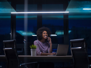 Image showing black businesswoman using a laptop in startup office