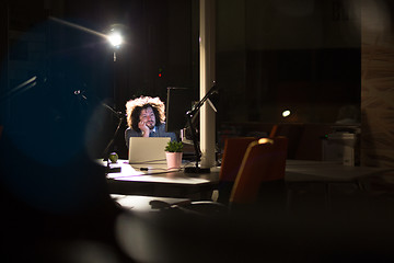 Image showing businessman relaxing at the desk