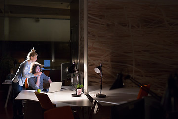 Image showing young designers in the night office