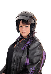 Image showing Middle age woman with helmet and jacket