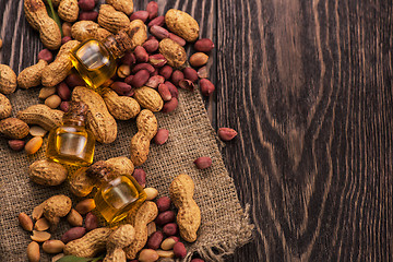 Image showing Natural peanut with oil in a glass