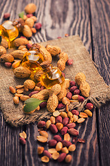 Image showing Natural peanut with oil in a glass