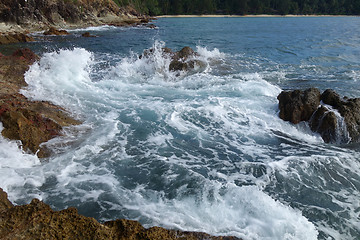 Image showing Waves on stone beach