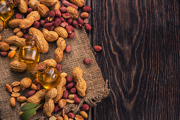 Image showing Natural peanut with oil in a glass