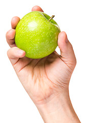 Image showing Hand with green apple