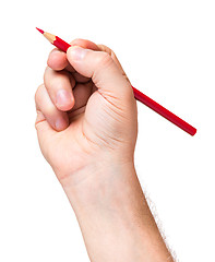 Image showing Hand with red pencil