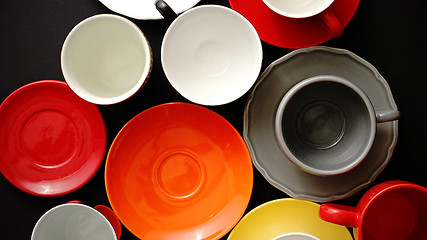 Image showing Empty colorful modern ceramic plates and cups collection