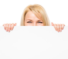 Image showing Woman with blank signboard