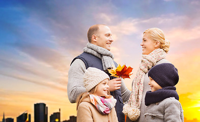 Image showing happy family over sunset in tallinn city in autumn