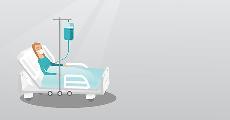 Image showing Patient lying in hospital bed with oxygen mask.