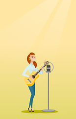 Image showing Woman singing into a microphone.