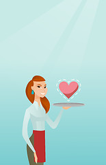 Image showing Waitress carrying a tray with a heart.