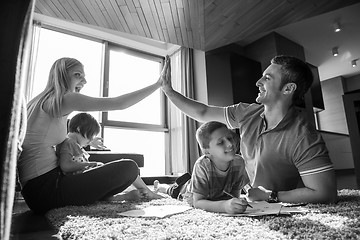 Image showing young couple spending time with kids