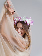 Image showing young bride in a wedding dress with a veil