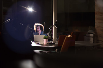 Image showing businessman relaxing at the desk