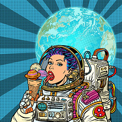 Image showing Woman astronaut eats planets of the solar system, like ice cream