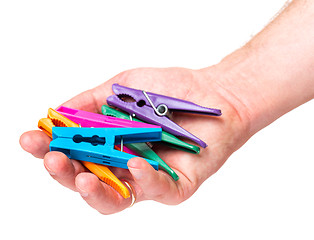 Image showing Hand with color clothespin