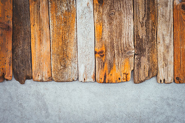 Image showing Old wooden planks on concrete background