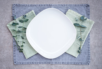 Image showing Eucalyptus branches decorating elegant table setting 