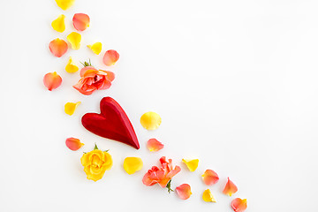 Image showing Red heart and rose petals