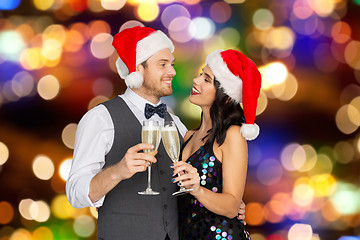 Image showing couple with champagne glasses at christmas party