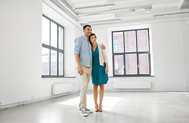 Image showing happy couple at new home