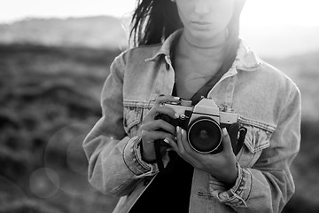 Image showing Woman Taking Picture Outdoors